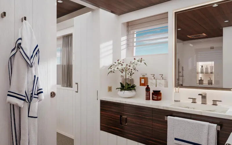  Yacht Photos Pics Luxurious bathroom with modern fixtures, wooden accents, and elegant decor in a Wider 76 yacht.