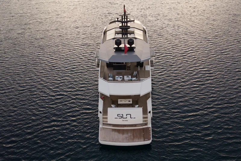 Sun Yacht Photos Pics Aerial view of 2012 Arcadia Yachts 115 luxury yacht on calm water.