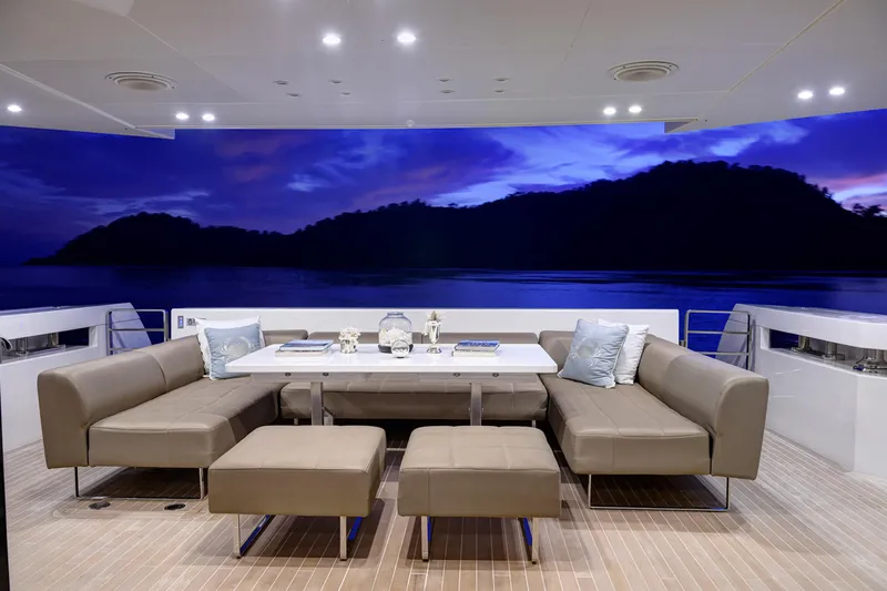 Sun Yacht Photos Pics Luxurious Arcadia Yachts 115 interior with elegant seating, ocean view, and ambient lighting, 2012 model.