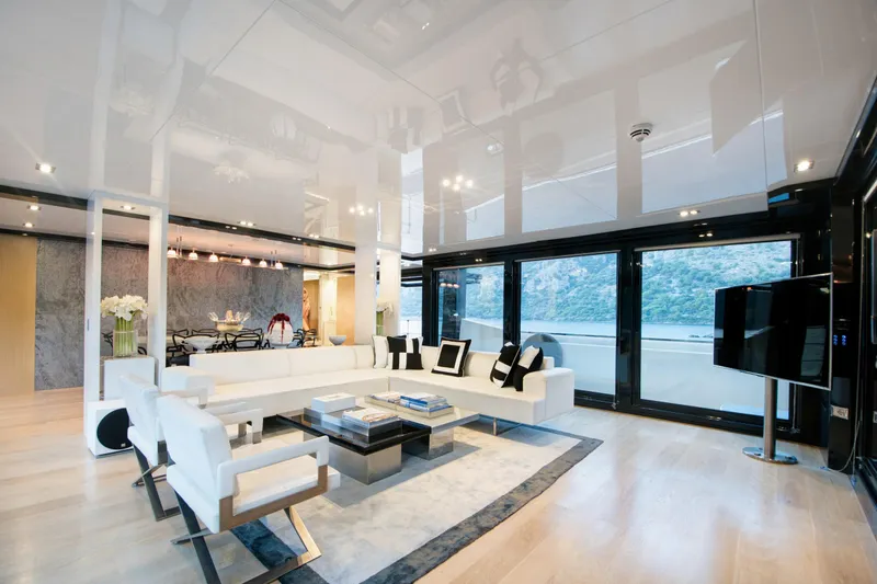 Sun Yacht Photos Pics Luxurious interior of 2012 Arcadia Yachts 115, featuring modern decor and panoramic windows.