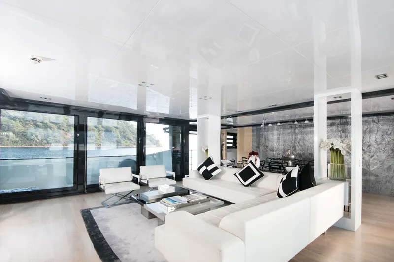 Sun Yacht Photos Pics Luxurious interior of 2012 Arcadia Yachts 115, featuring modern white and black decor.