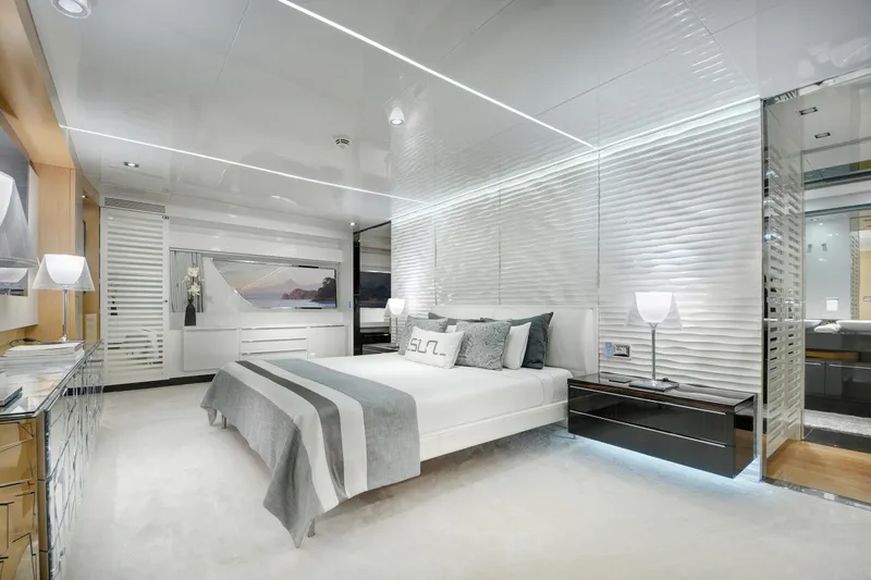 Sun Yacht Photos Pics Luxurious bedroom interior on 2012 Arcadia Yachts 115, featuring modern design and elegant decor.
