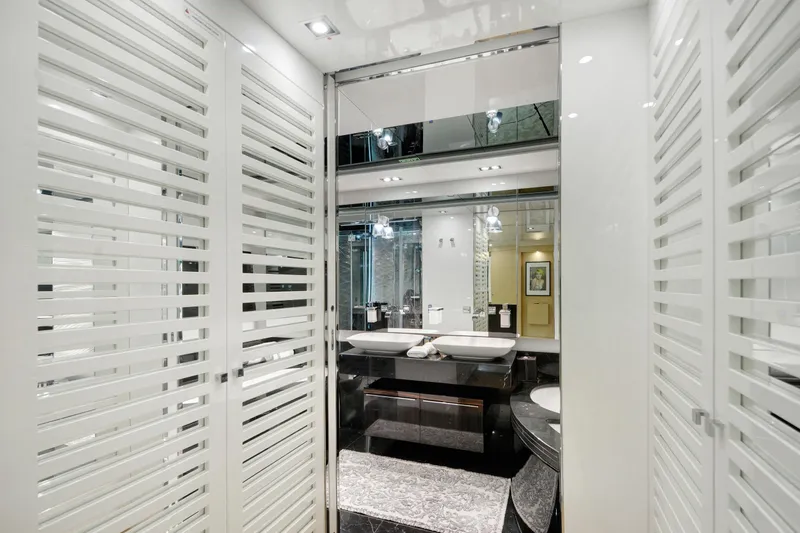 Sun Yacht Photos Pics Luxurious bathroom interior on 2012 Arcadia Yachts 115, featuring modern design and elegant fixtures.