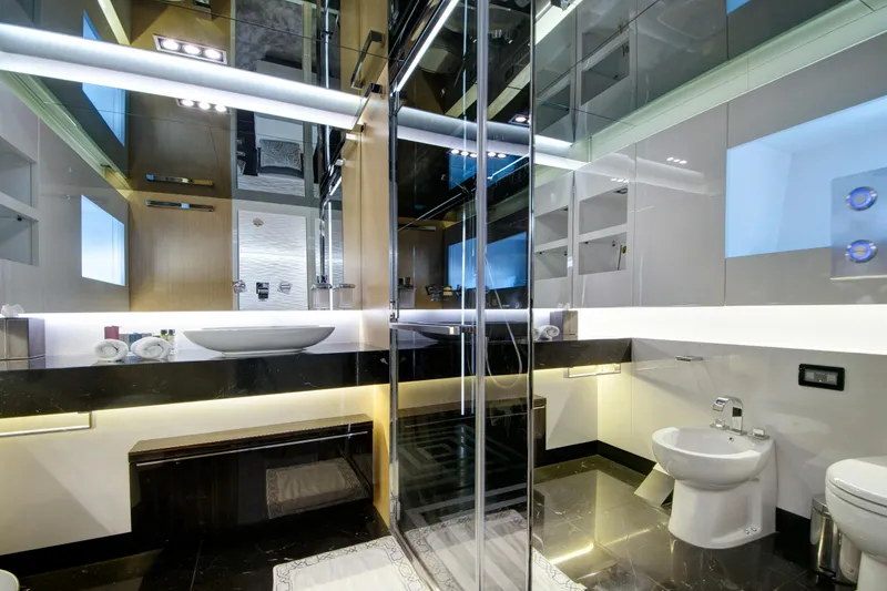 Sun Yacht Photos Pics Luxurious bathroom on 2012 Arcadia Yachts 115, featuring modern fixtures and elegant design.