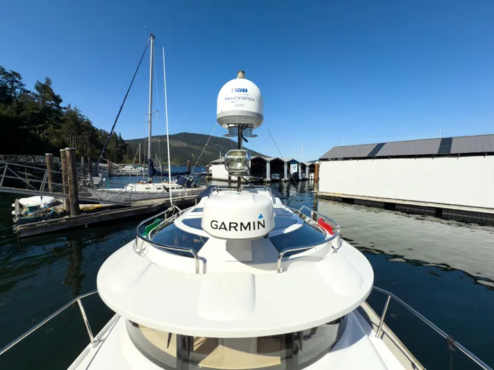  Yacht Photos Pics 2018 Ranger Tugs R-29 S boat docked, featuring Garmin navigation equipment.