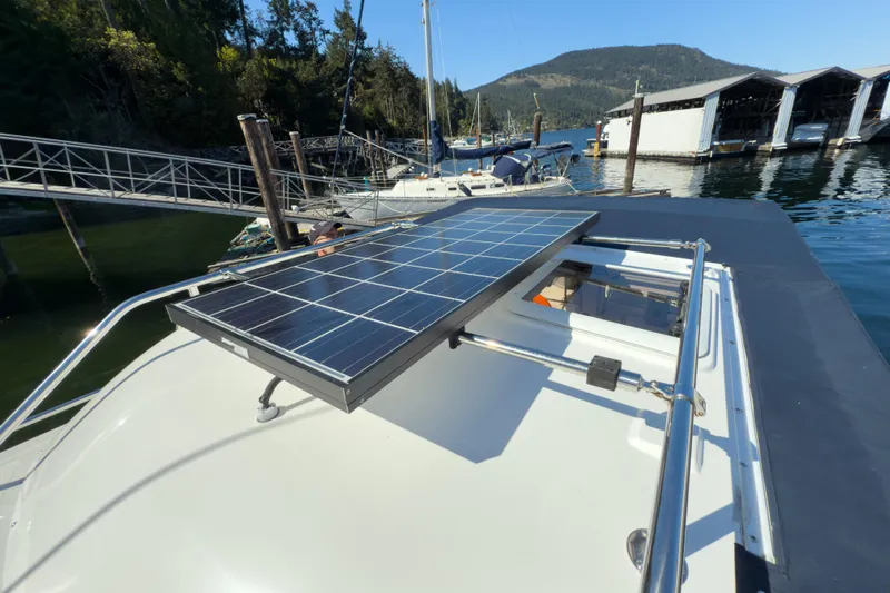  Yacht Photos Pics 2018 Ranger Tugs R-29 S with solar panel on deck, docked at marina.