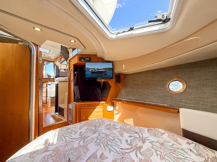 Yacht Photos Pics 2018 Ranger Tugs R-29 S cabin interior with skylight and TV.