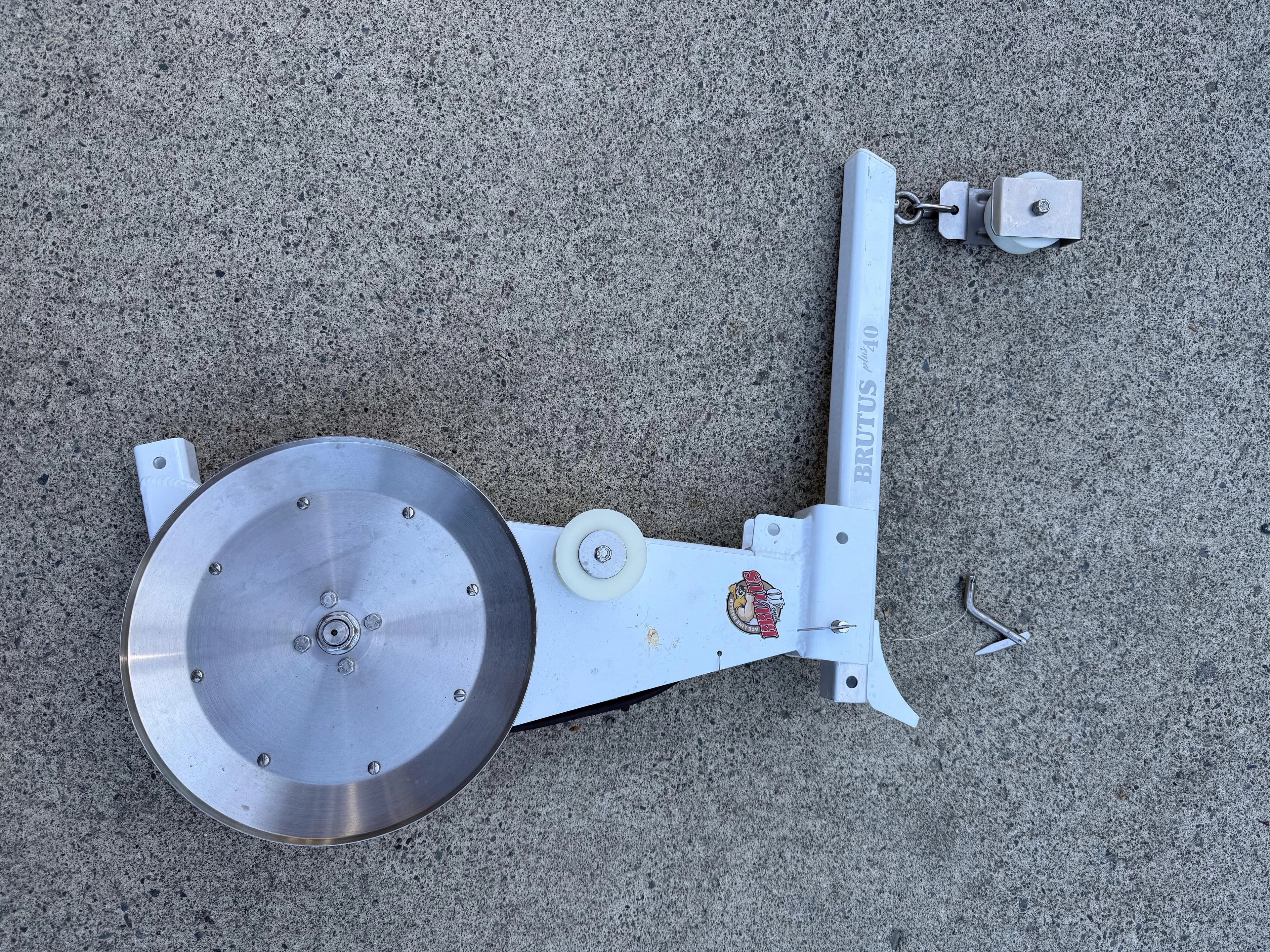  Yacht Photos Pics Fishing reel on concrete, likely for Ranger Tugs R-29 S, 2018 model.