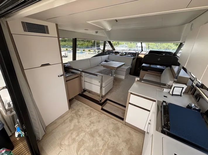  Yacht Photos Pics Luxurious interior of 2020 Jeanneau Prestige 460 yacht with modern furnishings and spacious layout.