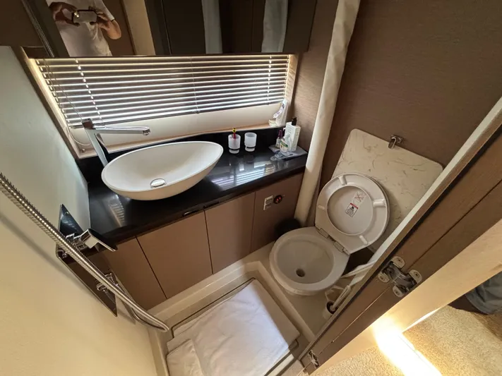  Yacht Photos Pics Luxurious bathroom in 2020 Jeanneau Prestige 460 yacht with modern sink and toilet.