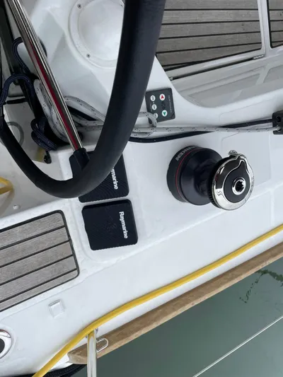  Yacht Photos Pics Cockpit view of 2023 Jeanneau Sun Odyssey 349 sailboat with winch and controls.