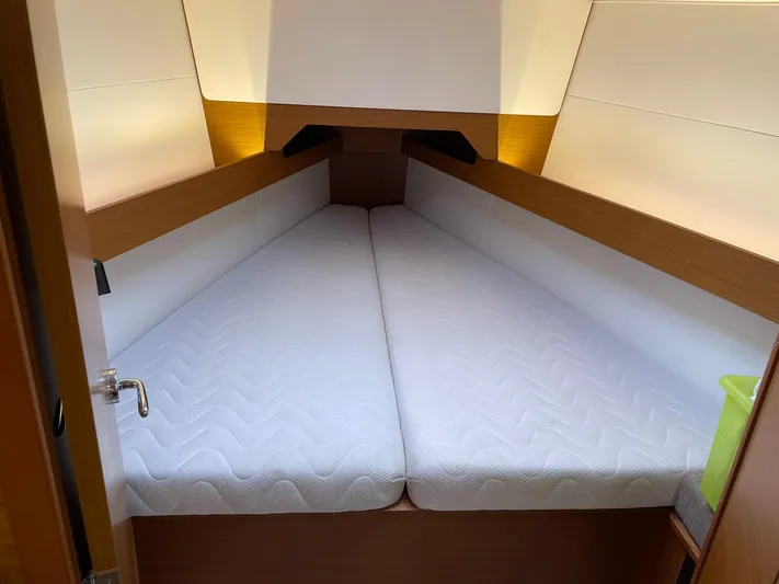  Yacht Photos Pics 2023 Jeanneau Sun Odyssey 349 cabin with comfortable V-berth and modern design.
