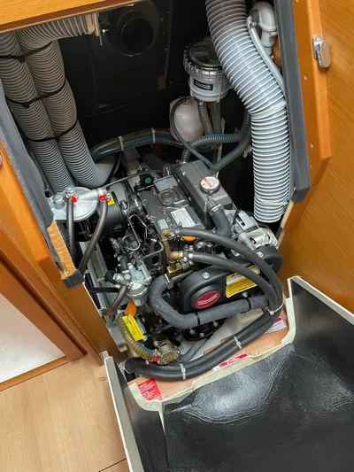 Yacht Photos Pics Engine compartment of 2023 Jeanneau Sun Odyssey 349 sailboat, showcasing detailed mechanical components.