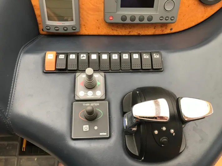  Yacht Photos Pics Control panel of a 2004 Azimut 55 yacht with switches and throttle.