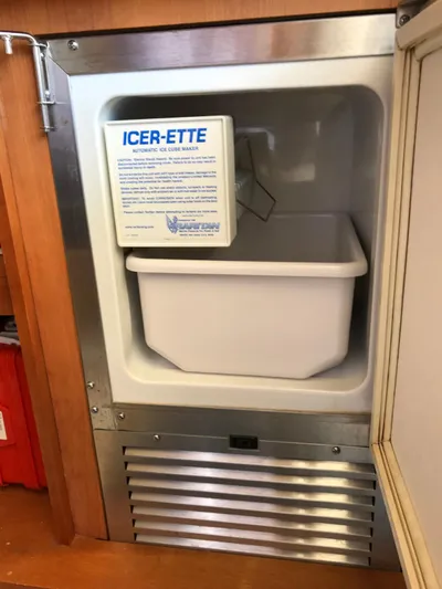  Yacht Photos Pics Ice maker inside 2004 Azimut 55 yacht, featuring Icer-Ette automatic ice cube maker.
