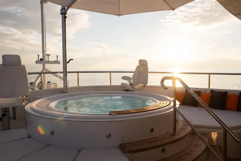 Crossed Sabre Yacht Photos Pics Luxurious 2006 Burger Trideck yacht with jacuzzi and sunset ocean view.