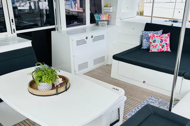 Habzie Yacht Photos Pics Luxurious interior of 2019 Lagoon 450 F Owner's Edition catamaran with stylish seating and decor.