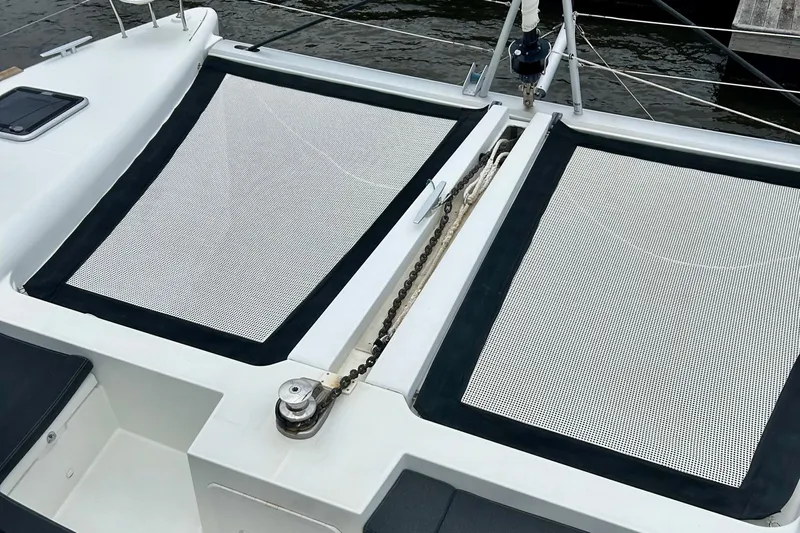 Habzie Yacht Photos Pics 2019 Lagoon 450 F Owner's Edition catamaran with netted deck area.