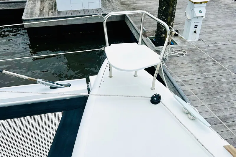 Habzie Yacht Photos Pics 2019 Lagoon 450 F Owner's Edition yacht at dock, featuring a sleek bow design.