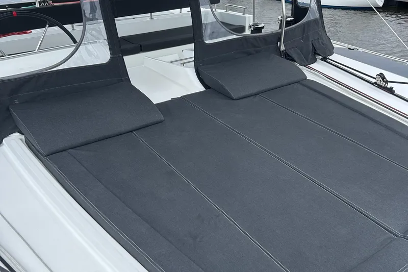 Habzie Yacht Photos Pics Sunbathing area on 2019 Lagoon 450 F Owner's Edition catamaran, featuring comfortable cushions.