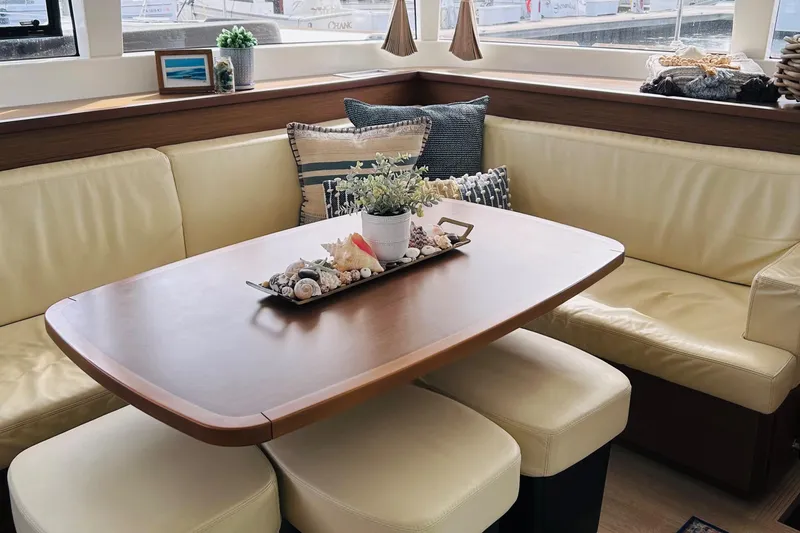 Habzie Yacht Photos Pics Luxurious interior of 2019 Lagoon 450 F Owner's Edition with elegant dining area.