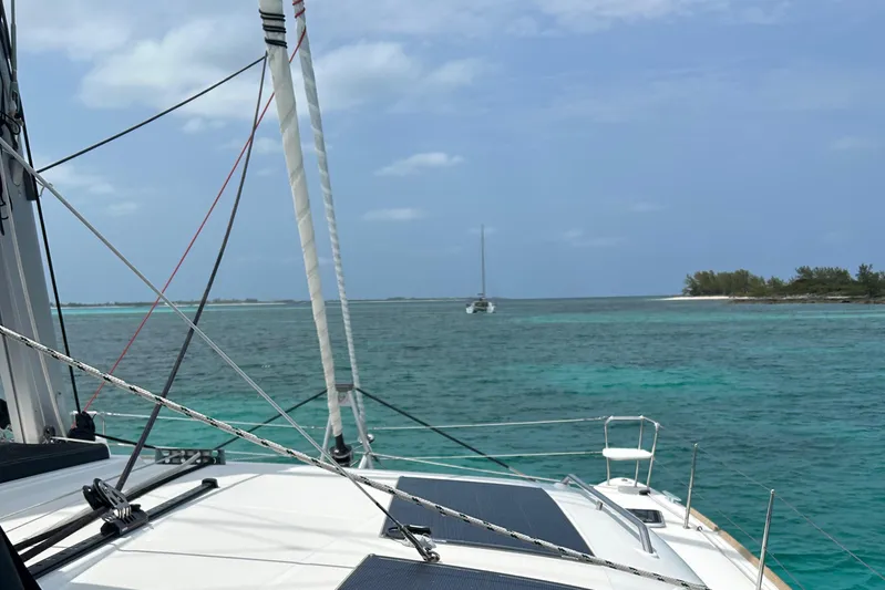 Habzie Yacht Photos Pics Sailing on a 2019 Lagoon 450 F Owner's Edition in clear turquoise waters.