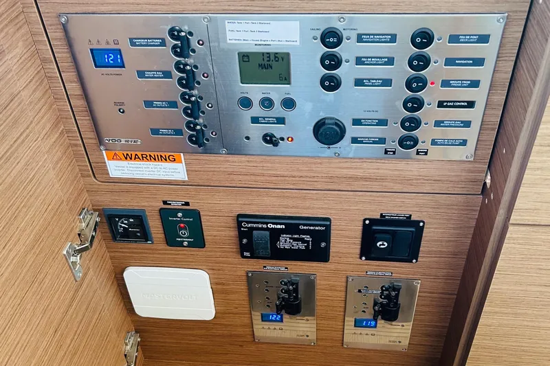 Habzie Yacht Photos Pics Control panel of a 2019 Lagoon 450 F Owner's Edition yacht, featuring various switches and displays.