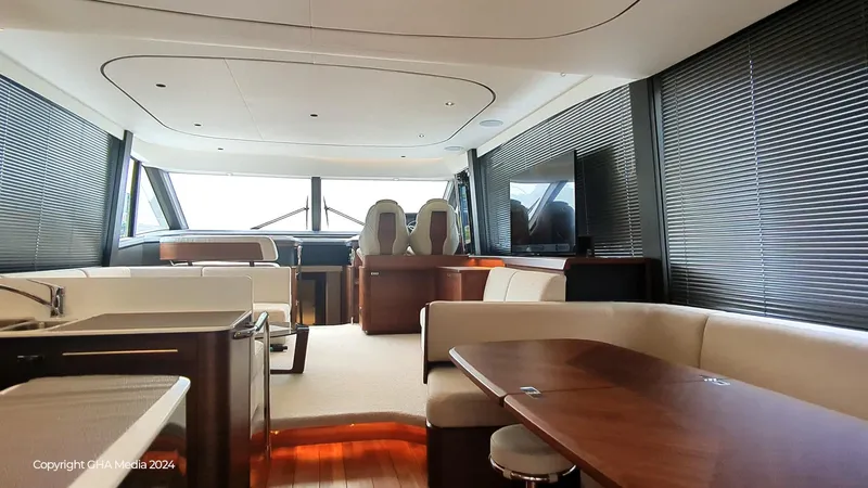  Yacht Photos Pics Luxurious interior of 2024 Princess F65 yacht with modern seating and sleek design.