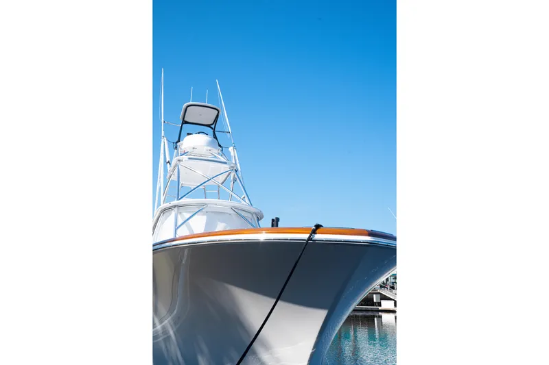 Front Runner Boatworks 47 Walkaround Yacht Photos Pics Front view of 2026 Front Runner 47WA boat against clear blue sky.