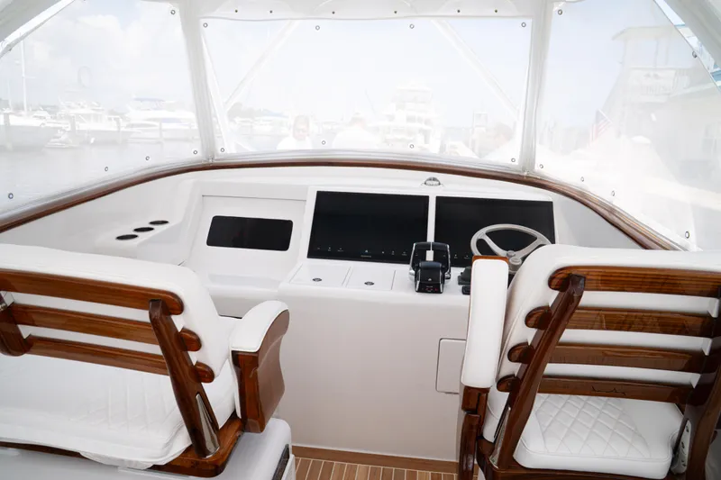 Front Runner Boatworks 47 Walkaround Yacht Photos Pics Helm of 2026 Front Runner 47WA boat with modern controls and seating.