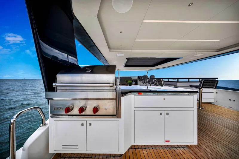  Yacht Photos Pics Outdoor kitchen on 2021 Sirena 88 yacht with ocean view and modern grill.