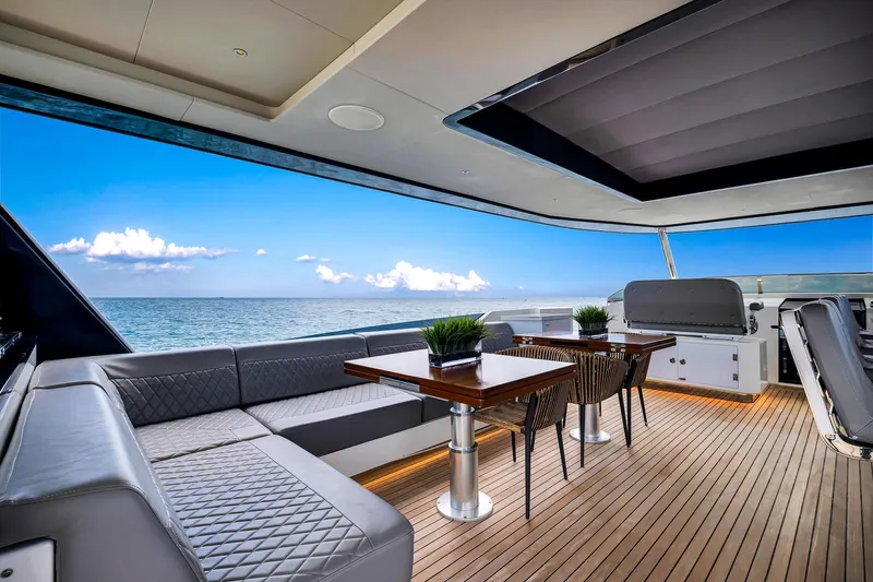  Yacht Photos Pics Luxurious 2021 Sirena 88 yacht deck with elegant seating and ocean view.