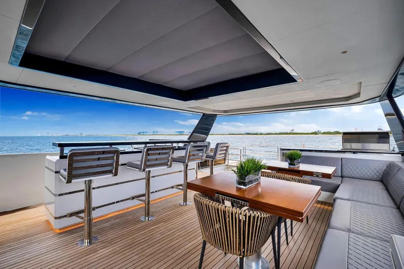  Yacht Photos Pics Luxurious 2021 Sirena 88 yacht deck with modern seating and ocean view.