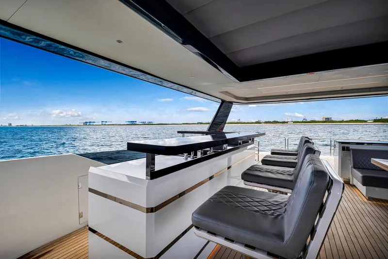  Yacht Photos Pics Luxurious 2021 Sirena 88 yacht deck with sleek seating and ocean view.
