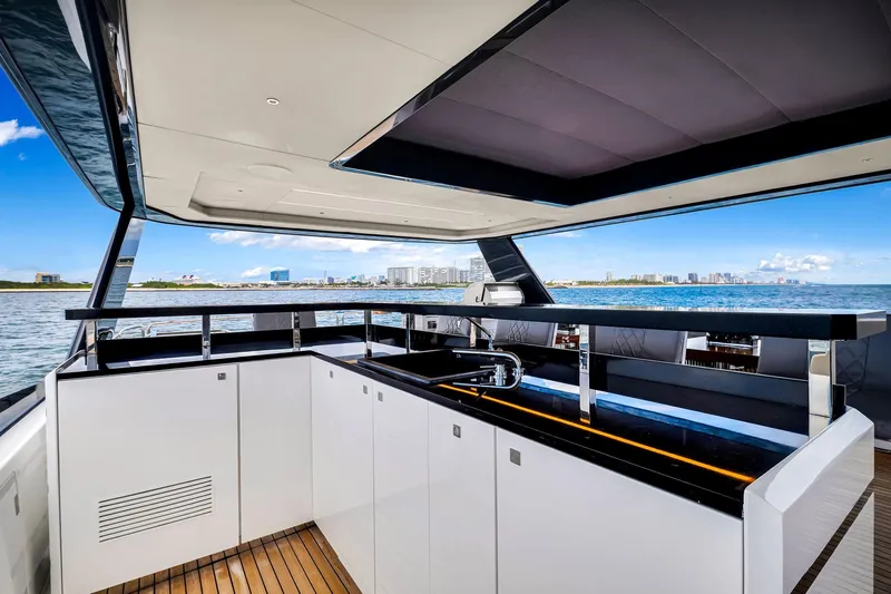  Yacht Photos Pics Luxurious 2021 Sirena 88 yacht interior with modern kitchen and ocean view.