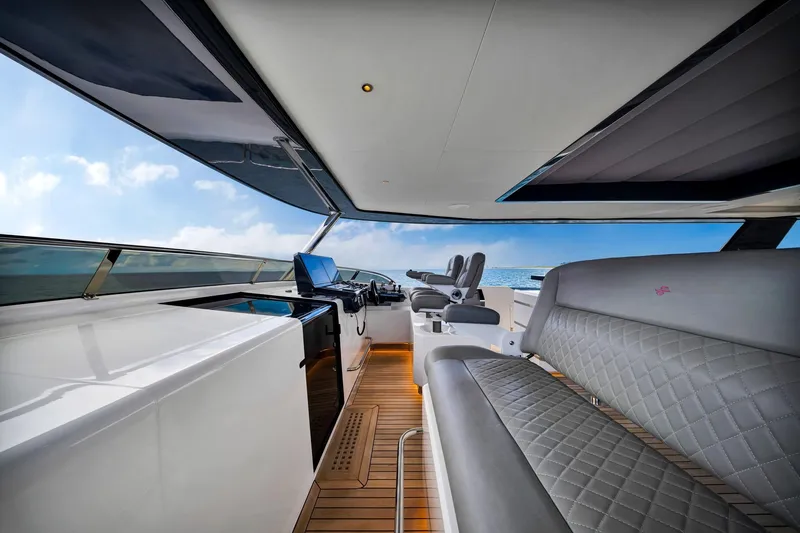  Yacht Photos Pics Luxurious interior of 2021 Sirena 88 yacht with modern seating and ocean view.
