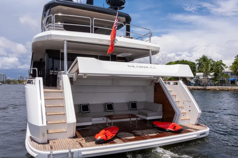  Yacht Photos Pics Luxury Sirena 88 yacht, 2021 model, with open deck and water sports equipment.