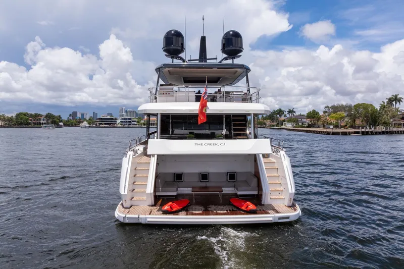  Yacht Photos Pics Luxury Sirena 88 yacht from 2021 on water, featuring spacious deck and modern design.