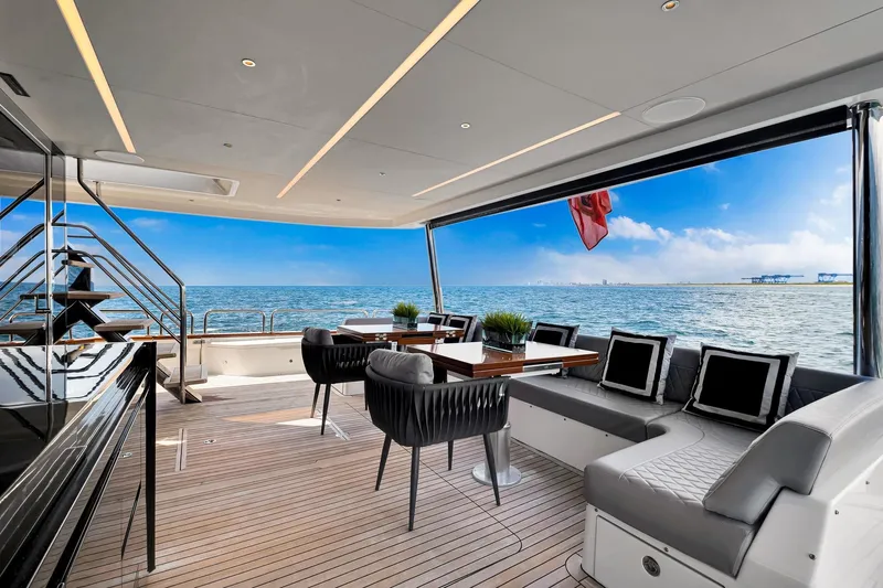  Yacht Photos Pics Luxurious 2021 Sirena 88 yacht deck with elegant seating, ocean view, and modern design.