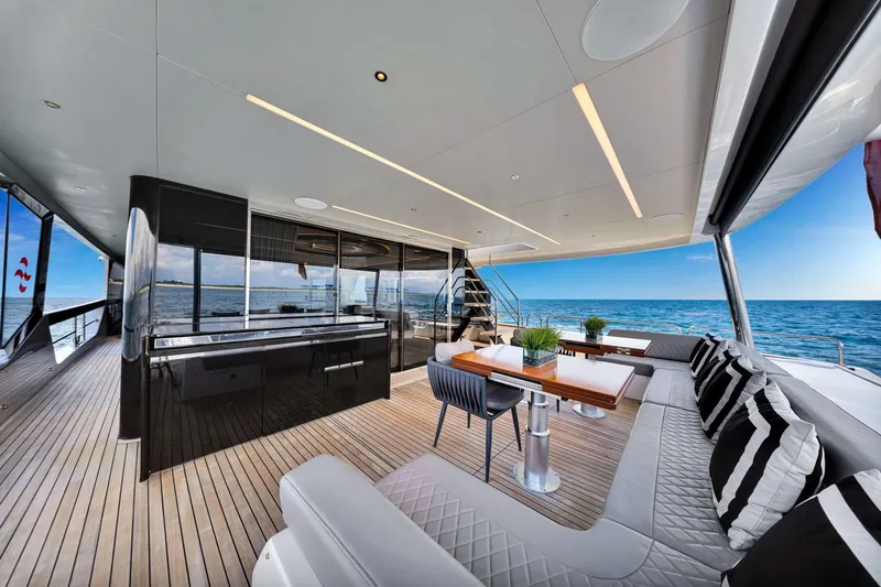  Yacht Photos Pics Luxurious 2021 Sirena 88 yacht interior with elegant seating, ocean view, and modern design.
