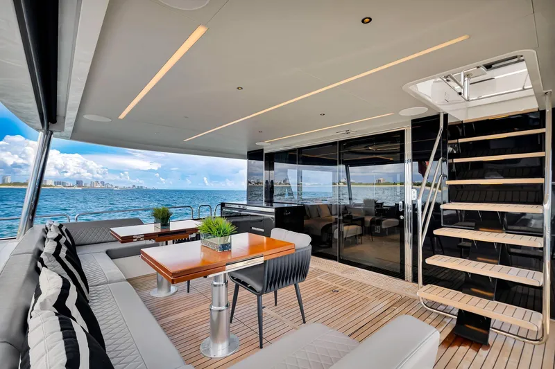 Yacht Photos Pics Luxurious 2021 Sirena 88 yacht deck with elegant seating and ocean view.