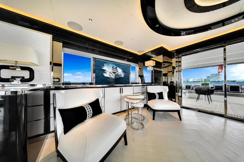  Yacht Photos Pics Luxurious interior of 2021 Sirena 88 yacht with modern furnishings and ocean view.