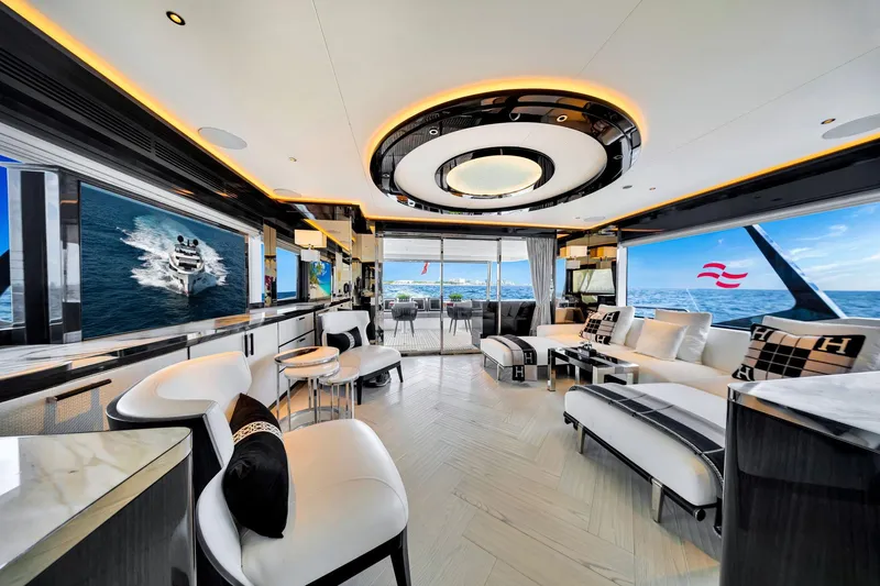  Yacht Photos Pics Luxurious interior of 2021 Sirena 88 yacht with modern furnishings and ocean view.