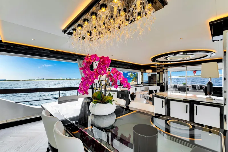  Yacht Photos Pics Luxurious interior of 2021 Sirena 88 yacht with elegant decor and ocean view.
