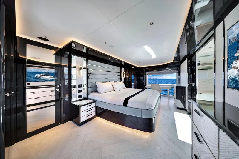  Yacht Photos Pics Luxurious interior of 2021 Sirena 88 yacht with modern bedroom and ocean view.