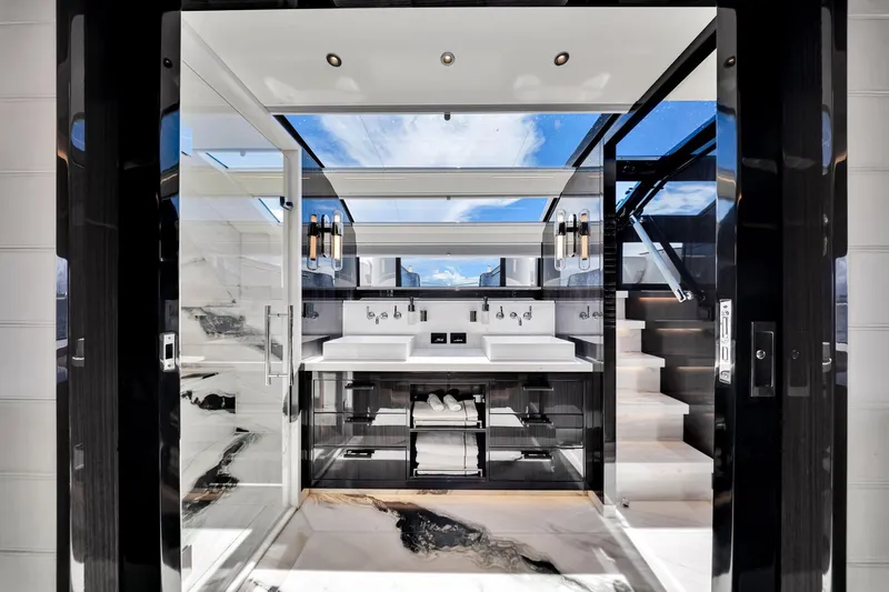  Yacht Photos Pics Luxurious bathroom interior on 2021 Sirena 88 yacht, featuring modern design and marble accents.