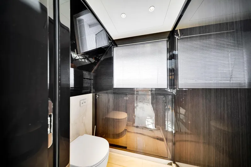  Yacht Photos Pics Luxurious bathroom interior on a 2021 Sirena 88 yacht, featuring sleek design and modern fixtures.