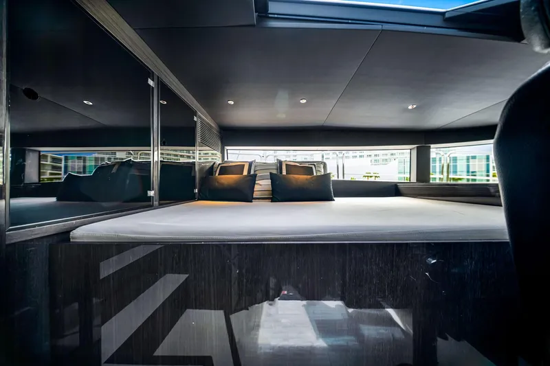  Yacht Photos Pics Luxurious interior of 2021 Sirena 88 yacht with modern design and plush bedding.