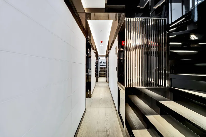  Yacht Photos Pics Luxurious interior hallway of 2021 Sirena 88 yacht, featuring sleek modern design.
