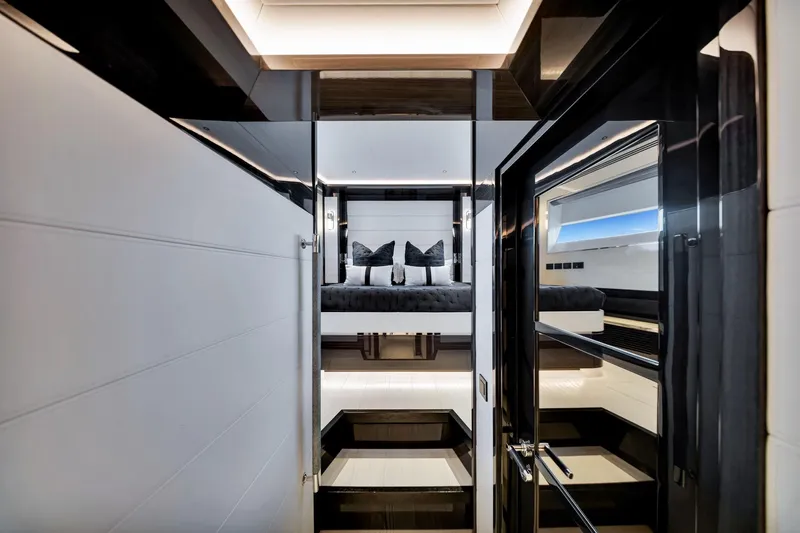 Yacht Photos Pics Luxurious interior of 2021 Sirena 88 yacht, featuring modern bedroom design.